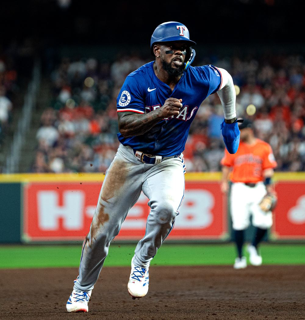 Foto de béisbol: jugadores en la base
